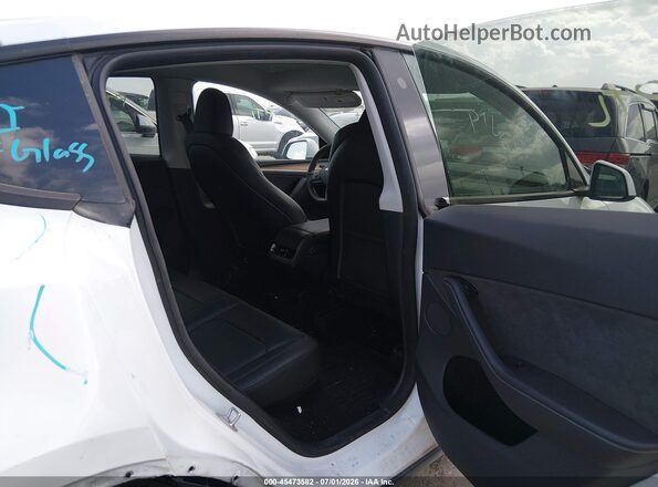 7SAYGDEE4PA126562 2023 TESLA MODEL Y White VIN კოდის სტიკერის ხედი