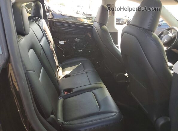 7SAYGDEE4PA156824 2023 TESLA MODEL Black Vista interior trasera