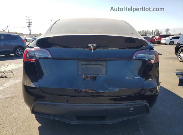 7SAYGDEE4PA156824 2023 TESLA MODEL Black Vista trasera