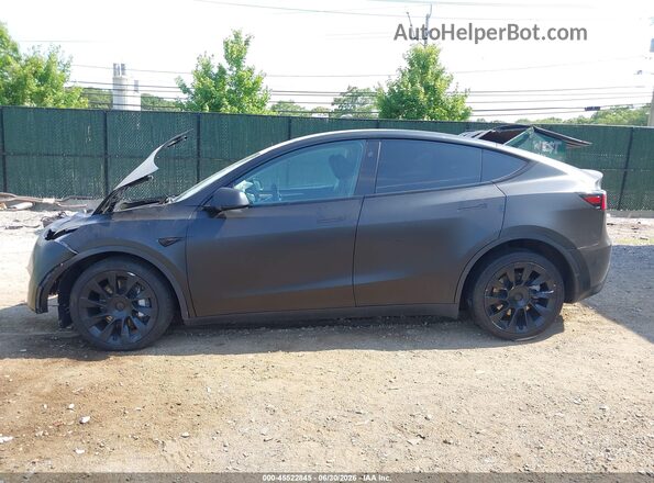 7SAYGDEE4PA172912 2023 TESLA MODEL Y Черный Вид задней части салона