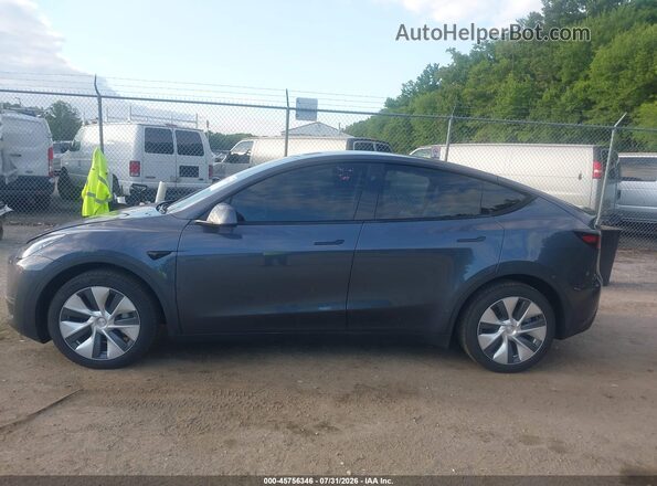 7SAYGDEE4PA205763 2023 TESLA MODEL Y Gray 
