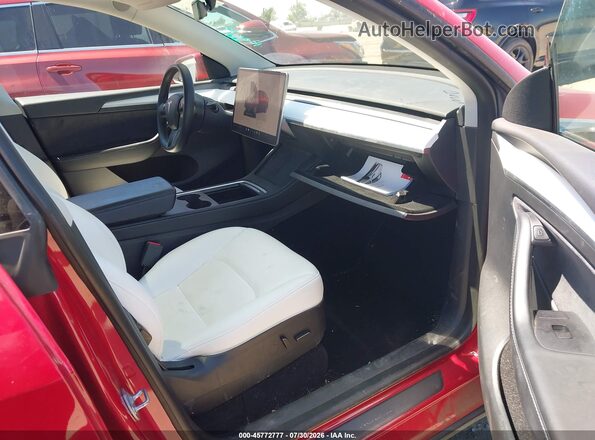 7SAYGDEE4PF624649 2023 TESLA MODEL Y Red Front interior view