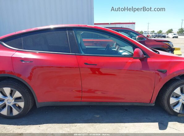 7SAYGDEE4PF624649 2023 TESLA MODEL Y Red 360 interior view