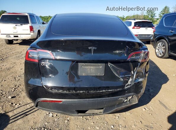 7SAYGDEE4PF628068 2023 TESLA MODEL Black Հետևի տեսք
