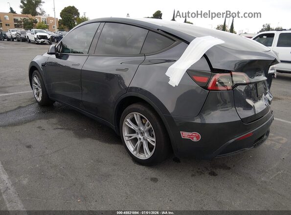 7SAYGDEE4PF898403 2023 TESLA MODEL Y Gray Trasero izquierdo