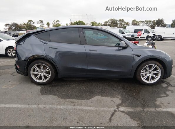 7SAYGDEE4PF898403 2023 TESLA MODEL Y Gray Vista interior trasera