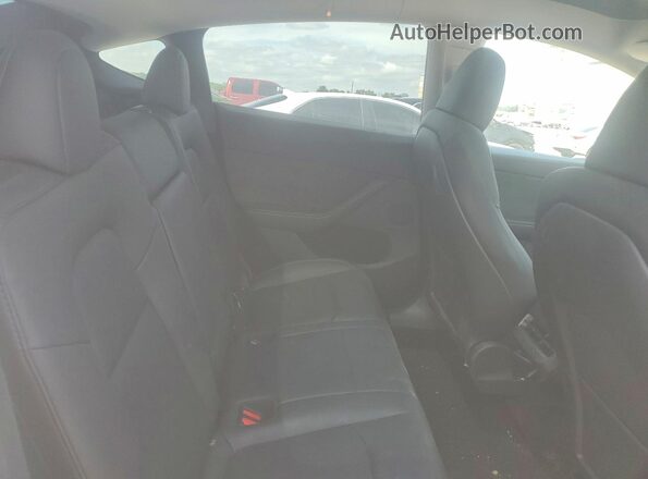 7SAYGDEE4RA216278 2024 TESLA MODEL White უკანა სავარძლების ხედი