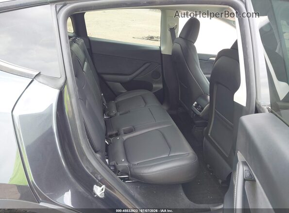 7SAYGDEE4RF128608 2024 TESLA MODEL Y Gray VIN კოდის სტიკერის ხედი