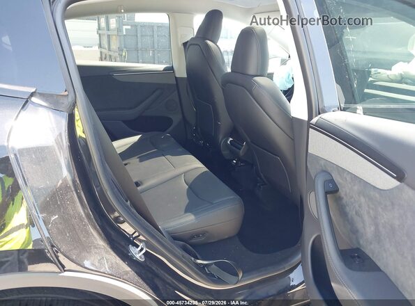7SAYGDEE4TF543614 2026 TESLA MODEL Y Black VIN կոդի պիտակի տեսք