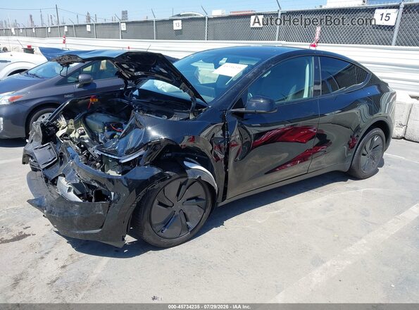 7SAYGDEE4TF543614 2026 TESLA MODEL Y Black Առջևի ձախ երեք քառորդ տեսարան