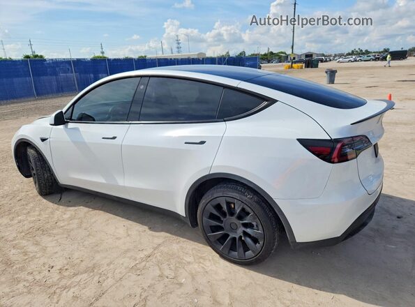 7SAYGDEE5PA092096 2023 TESLA MODEL White Trasero izquierdo