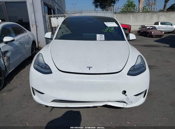 7SAYGDEE5PA093944 2023 TESLA MODEL Y White Vista interior trasera