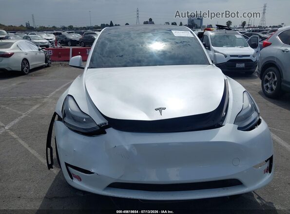 7SAYGDEE5PA185278 2023 TESLA MODEL Y White Widok wnętrza z tyłu