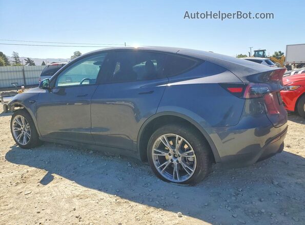 7SAYGDEE5PF909649 2023 TESLA MODEL Charcoal Trasero izquierdo