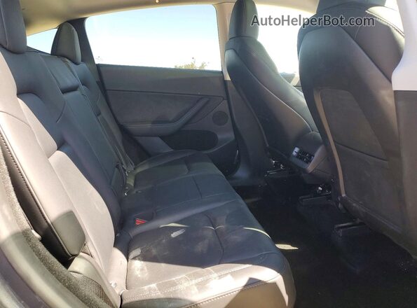 7SAYGDEE5PF909649 2023 TESLA MODEL Charcoal Vista interior trasera