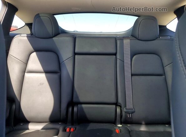 7SAYGDEE5PF909649 2023 TESLA MODEL Charcoal Vista de los asientos traseros