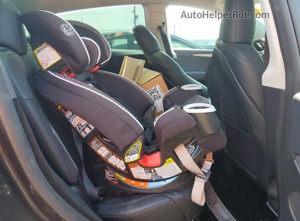 7SAYGDEE5RF031434 2024 TESLA MODEL Серый Вид задней части салона
