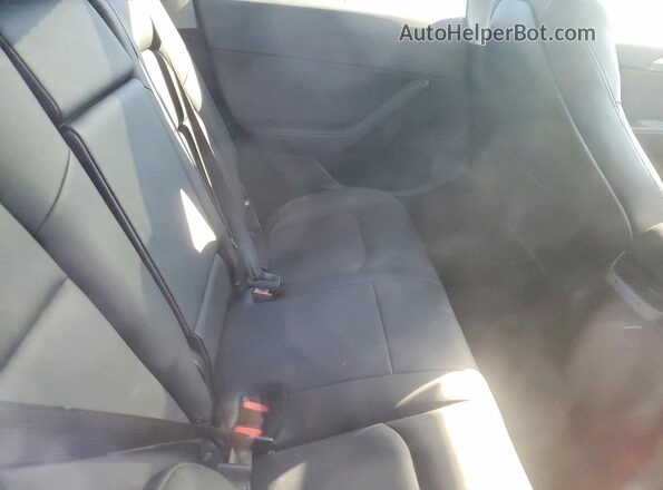 7SAYGDEE5SF247578 2025 TESLA MODEL Black Rear seats view
