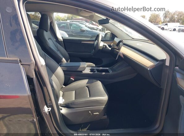 7SAYGDEE5SF285425 2025 TESLA MODEL Y Dark Blue Вид салона спереди