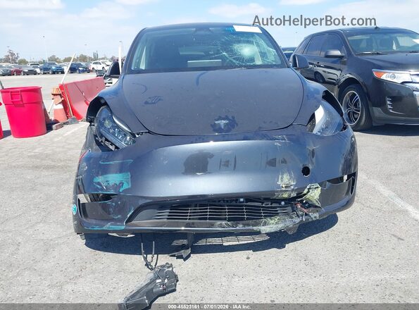 7SAYGDEE5SF285425 2025 TESLA MODEL Y Dark Blue Вид панели приборов
