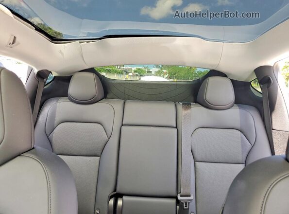 7SAYGDEE5TA414097 2026 TESLA MODEL White Widok tylnych siedzeń