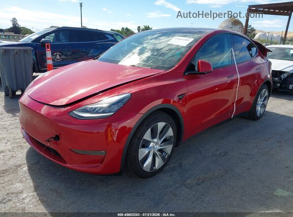 7SAYGDEE6NF368964 2022 TESLA MODEL Y Red Vista tres cuartos delantera izquierda
