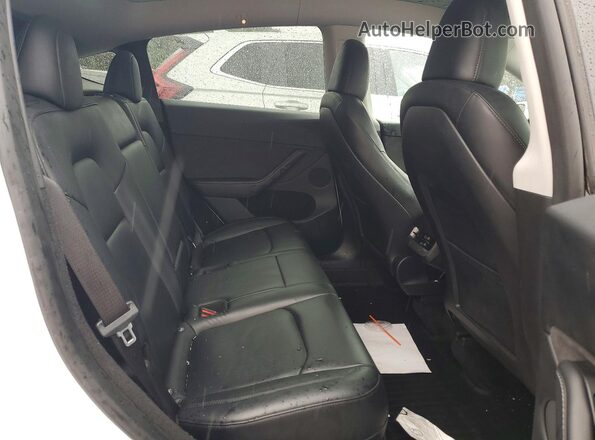 7SAYGDEE6PA184978 2023 TESLA MODEL White უკანა სავარძლების ხედი