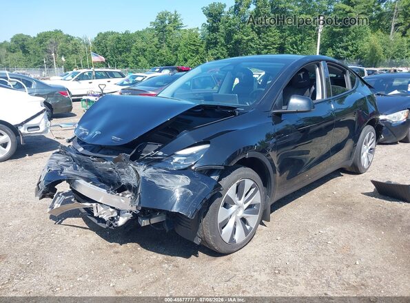 7SAYGDEE6PA187573 2023 TESLA MODEL Y Black Przód lewy