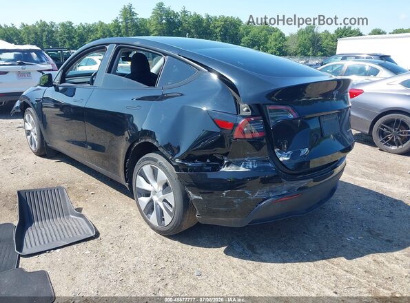 7SAYGDEE6PA187573 2023 TESLA MODEL Y Black Tył lewy