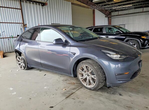 7SAYGDEE6PF599866 2023 TESLA MODEL Gray Delantero derecho