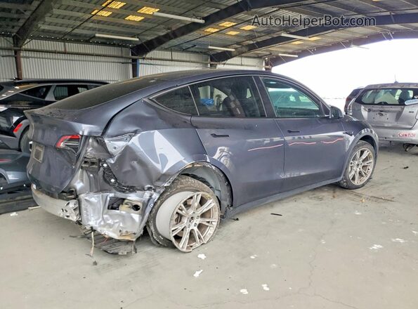 7SAYGDEE6PF599866 2023 TESLA MODEL Gray Trasero derecho