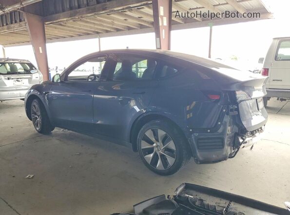 7SAYGDEE6PF599866 2023 TESLA MODEL Gray Trasero izquierdo