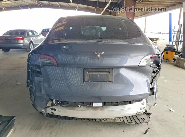 7SAYGDEE6PF599866 2023 TESLA MODEL Gray Vista trasera