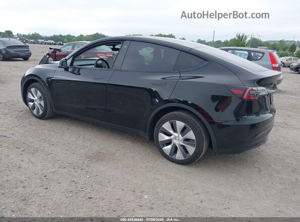 7SAYGDEE6PF757591 2023 TESLA MODEL Y Black Trasero izquierdo