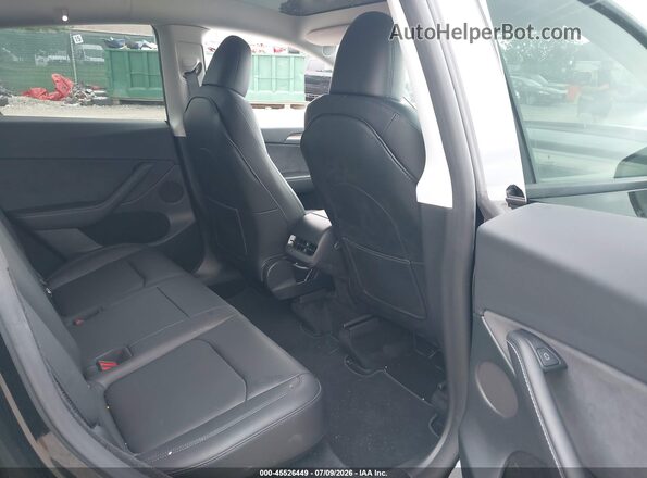7SAYGDEE6PF757591 2023 TESLA MODEL Y Black Vista de la etiqueta del VIN