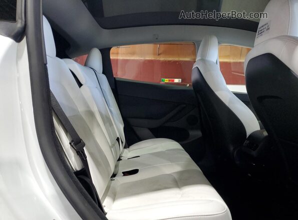 7SAYGDEE6PF831382 2023 TESLA MODEL White Սալոնի հետևի տեսք