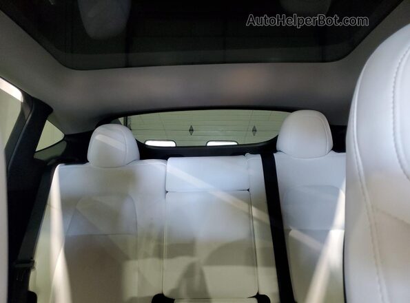 7SAYGDEE6PF831382 2023 TESLA MODEL White Հետևի նստատեղերի տեսք