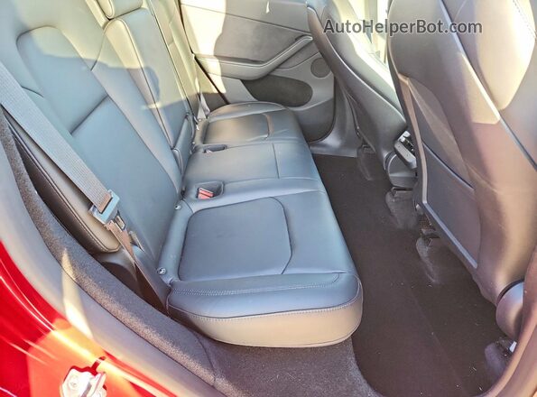 7SAYGDEE6RA248942 2024 TESLA MODEL Red Vista de los asientos traseros