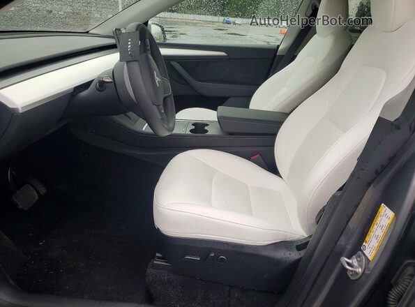 7SAYGDEE6SF297793 2025 TESLA MODEL Silver Вид салону спереду