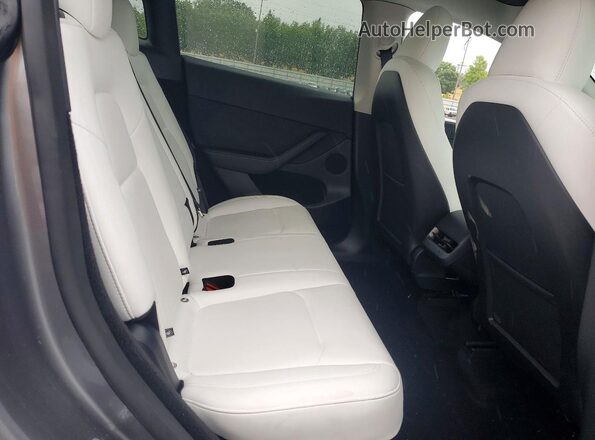 7SAYGDEE6SF297793 2025 TESLA MODEL Silver Вид задніх сидінь