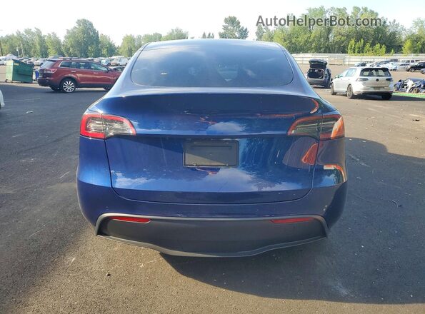7SAYGDEE7NF344995 2022 TESLA MODEL Blue Widok z tyłu