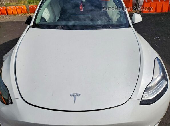7SAYGDEE7NF407240 2022 TESLA MODEL White Rear interior view