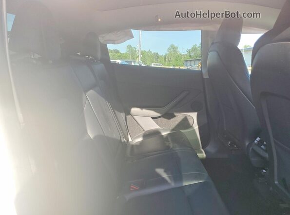 7SAYGDEE7PA114566 2023 TESLA MODEL White Սալոնի հետևի տեսք