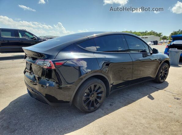 7SAYGDEE7PA141797 2023 TESLA MODEL Black Հետևի աջ