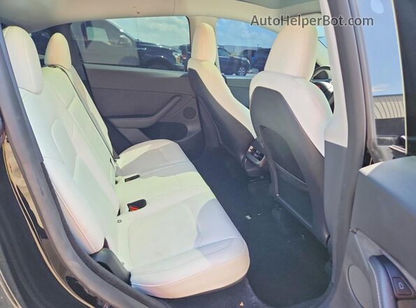 7SAYGDEE7PA141797 2023 TESLA MODEL Black Հետևի նստատեղերի տեսք