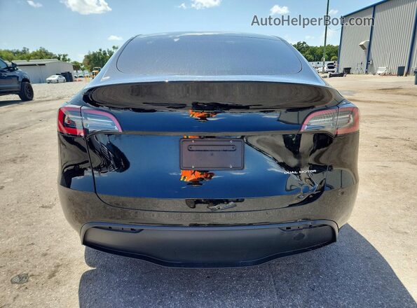 7SAYGDEE7PA141797 2023 TESLA MODEL Black Հետևի տեսք