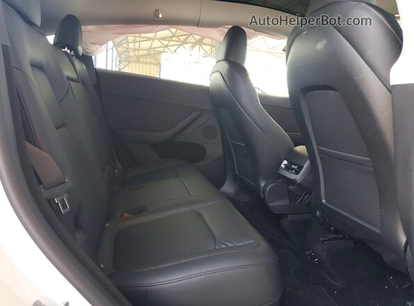7SAYGDEE7PA190613 2023 TESLA MODEL White Vista de los asientos traseros