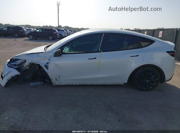 7SAYGDEE7PF616528 2023 TESLA MODEL Y White Սալոնի հետևի տեսք
