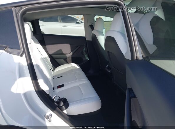 7SAYGDEE7PF616528 2023 TESLA MODEL Y White VIN կոդի պիտակի տեսք