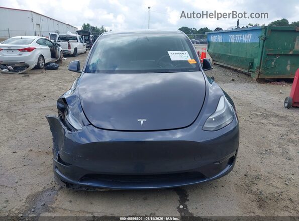 7SAYGDEE7PF707251 2023 TESLA MODEL Y Серый Вид панели приборов